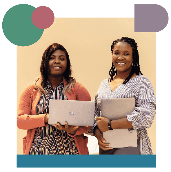 Two women standing side by side, smiling and holding laptops. One wears a striped shirt and pink cardigan, the other a striped blouse. Geometric shapes decorate the corners of the image.